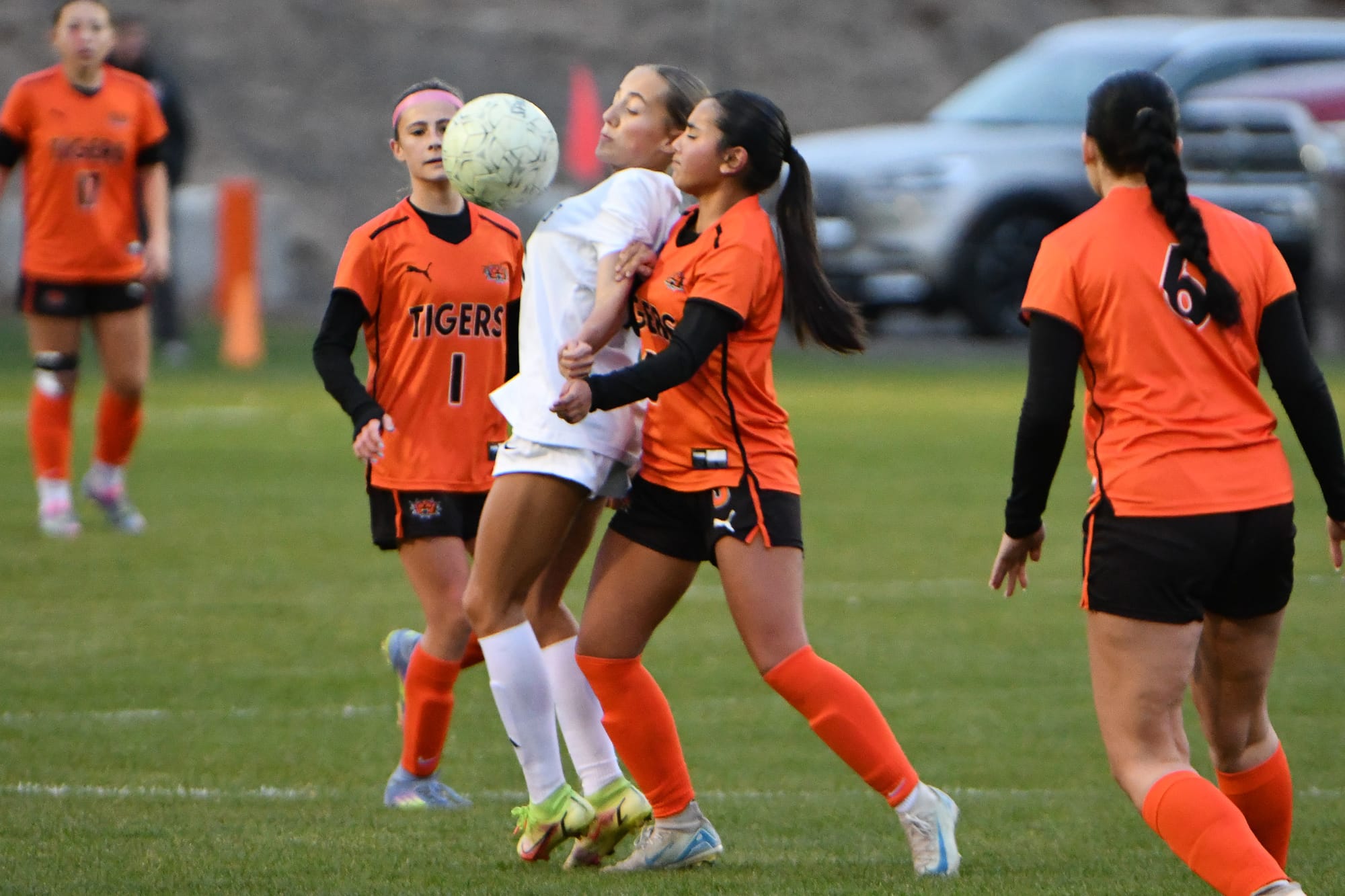 Alexis St. Mary (3) fights for position as Sophie Molitor (1) and Lacey Burton (6) ready to support.