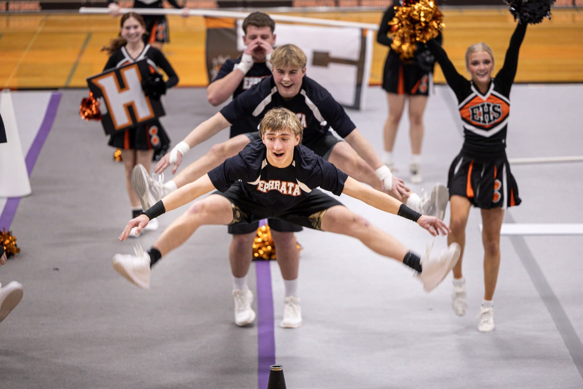 Ephrata's Charles Poirrier and Carson Andrus nail a toe touch jump.