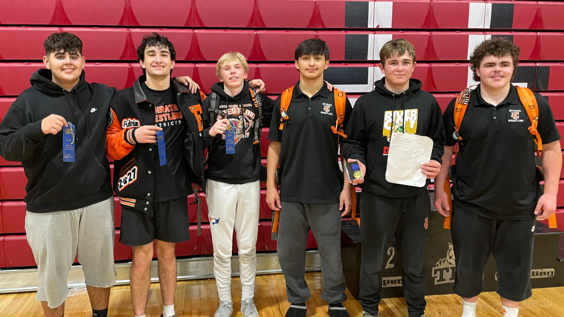 Staples, Woods are district champs; 6 Tigers head to Mat Classic