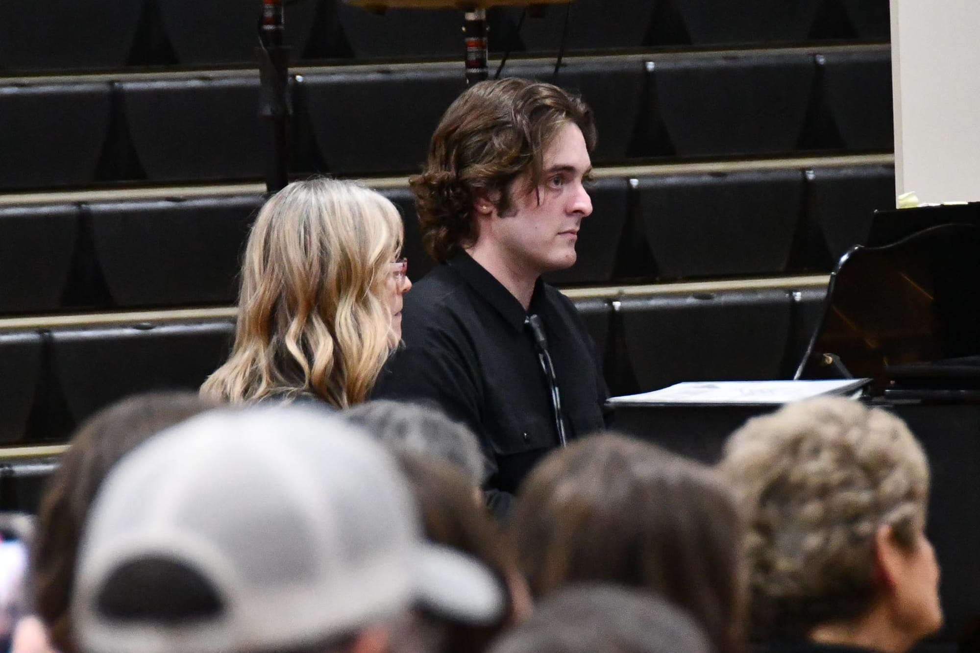 Gus O'Donnell and Cecelia Couture provide piano accompaniment.