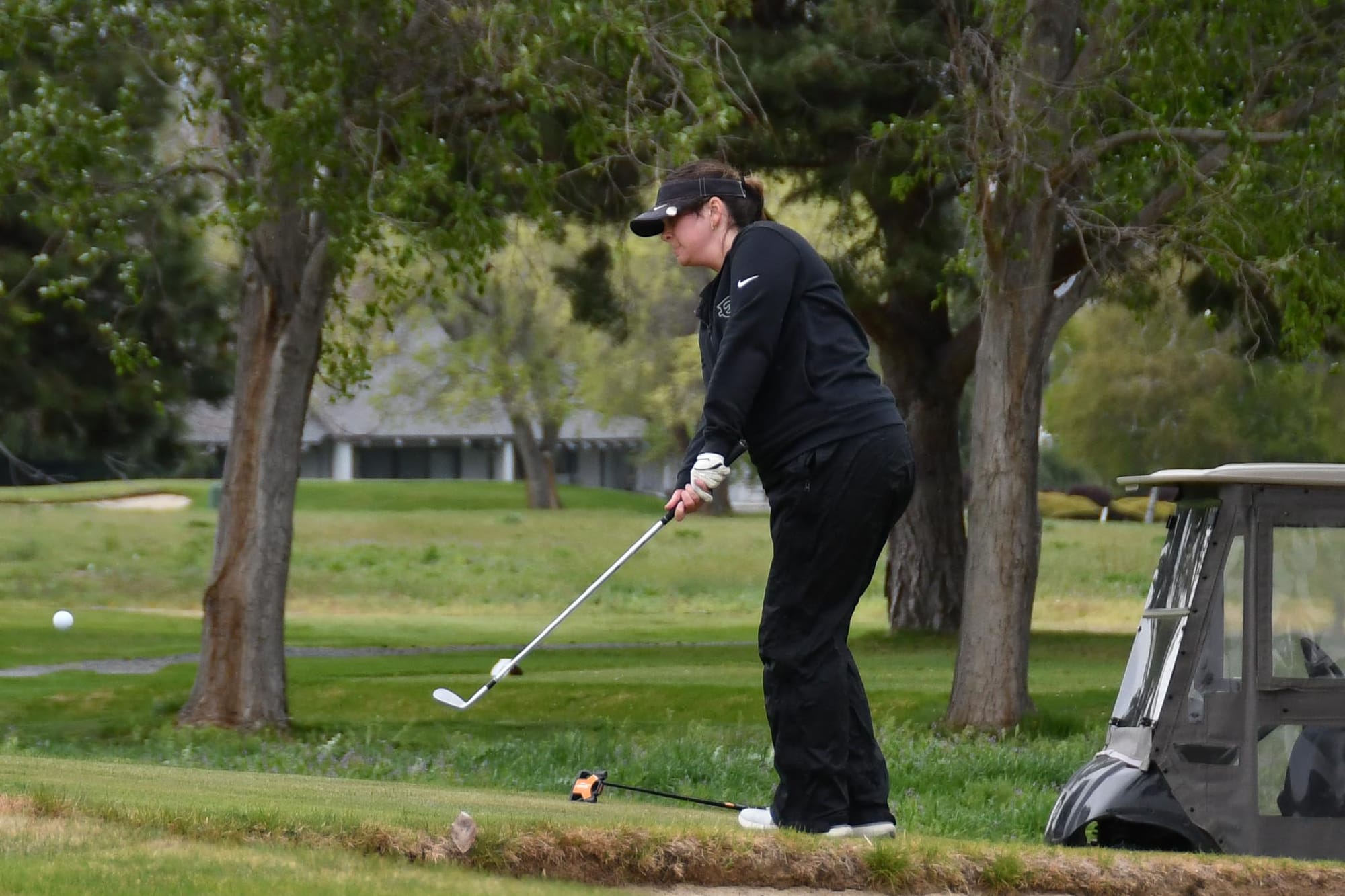 Ephrata's Ceci Roth chips onto the green on hole 11 