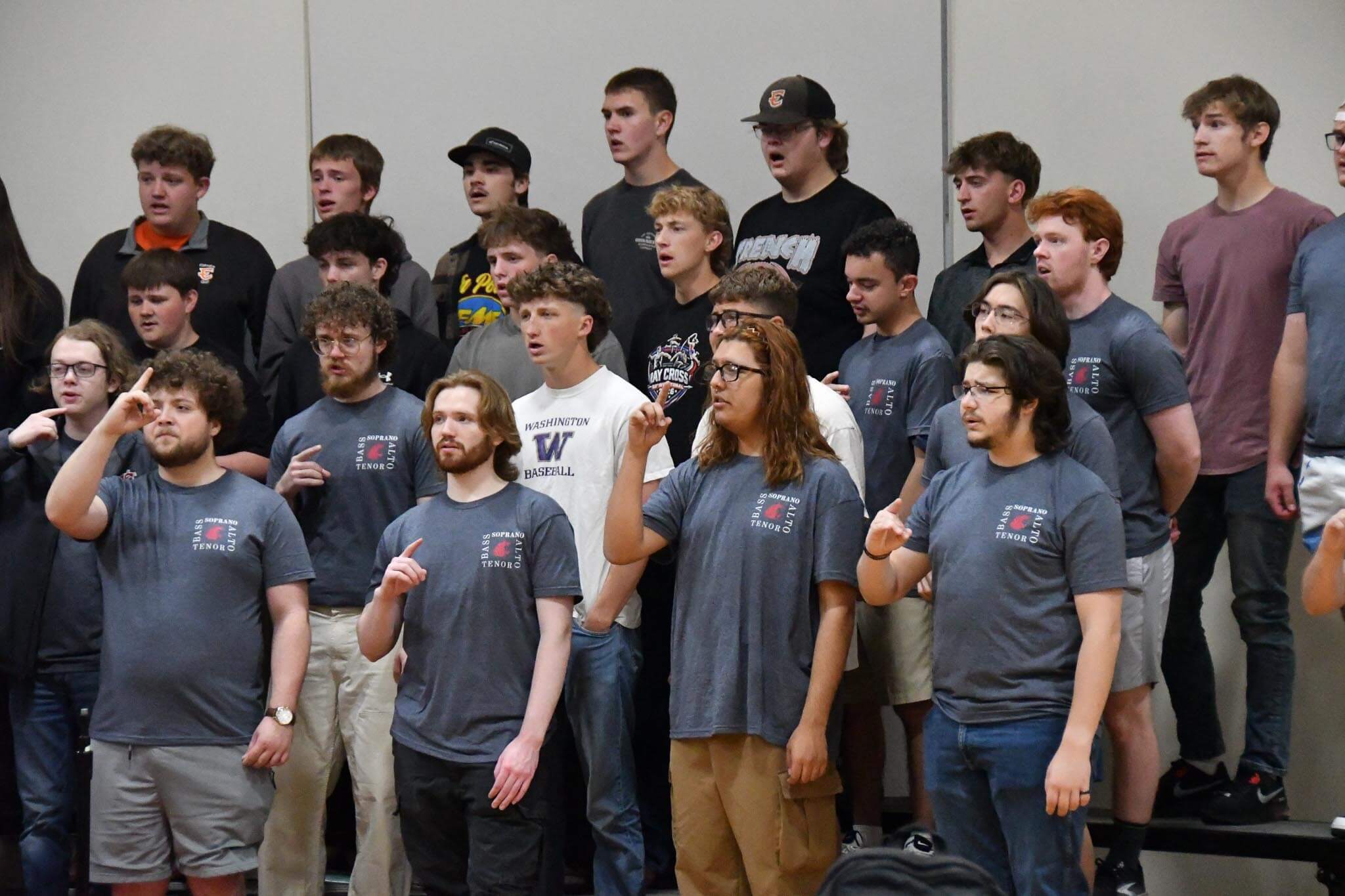 WSU singers (gray) warming up with the EHS choir Thursday morning.
