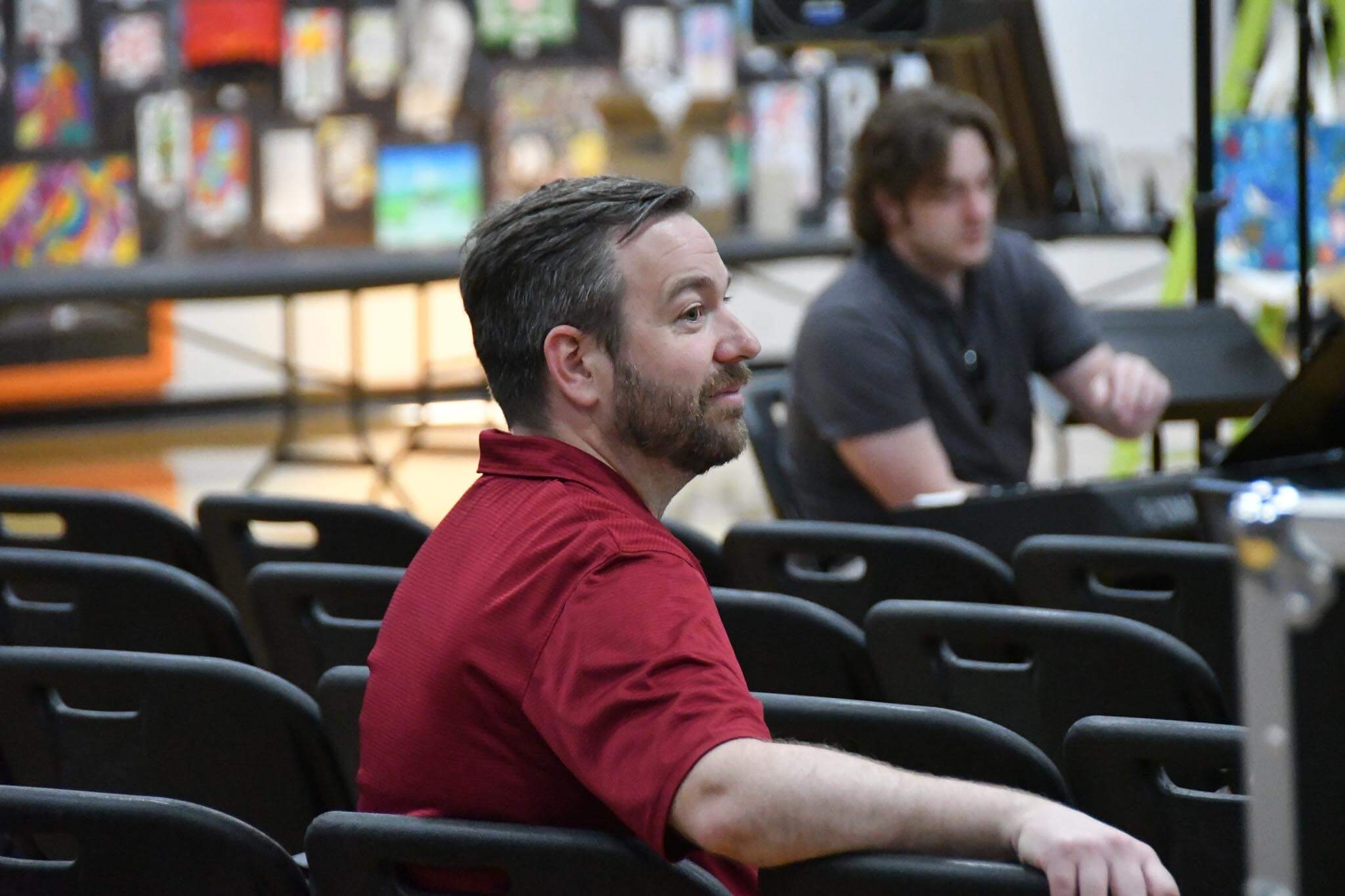 Dr. Matthew Myers, WSU's associate director of choral activities, listens as the EHS choir performs Thursday morning.