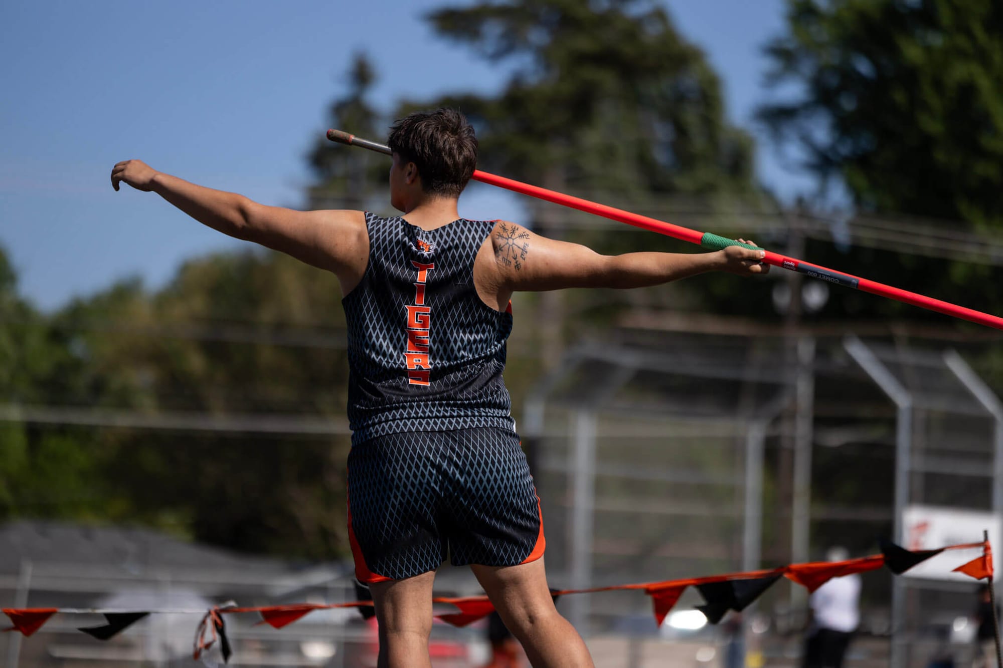 Senior Jacob Bartlett launches a throw during the javelin competition Thursday, May 7. Bartlett won the event at 151 feet, 9 inches.