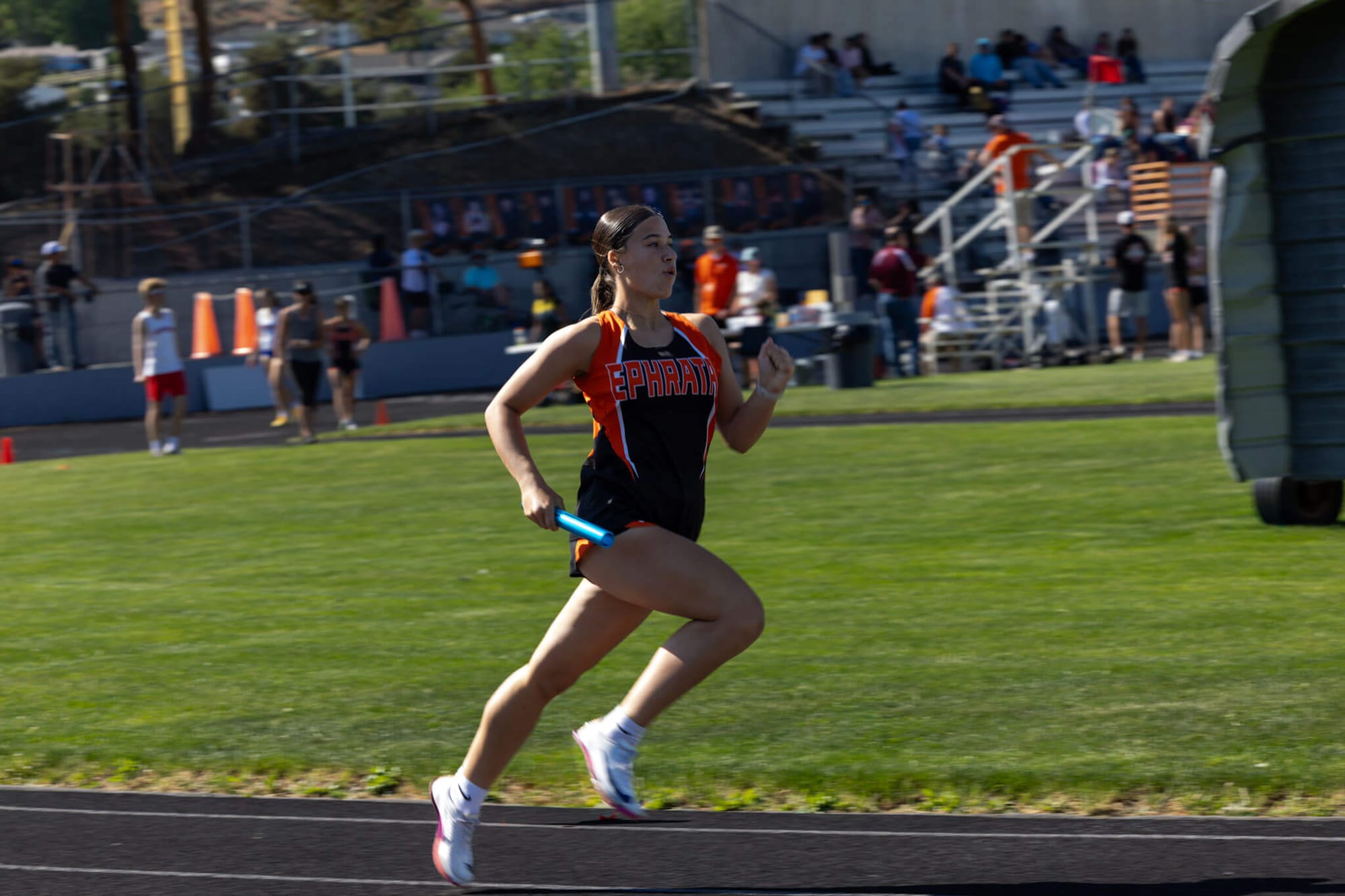 Sophomore Brinlea Ohl runs her leg of the 4x200 relay. The Lady Tiger relay of Alexis St. Mary, Jasmine Hernandez, Cynthia Villagran Morales and Ohl placed second in 1:53.26, just 13 hundredths behind Prosser.
