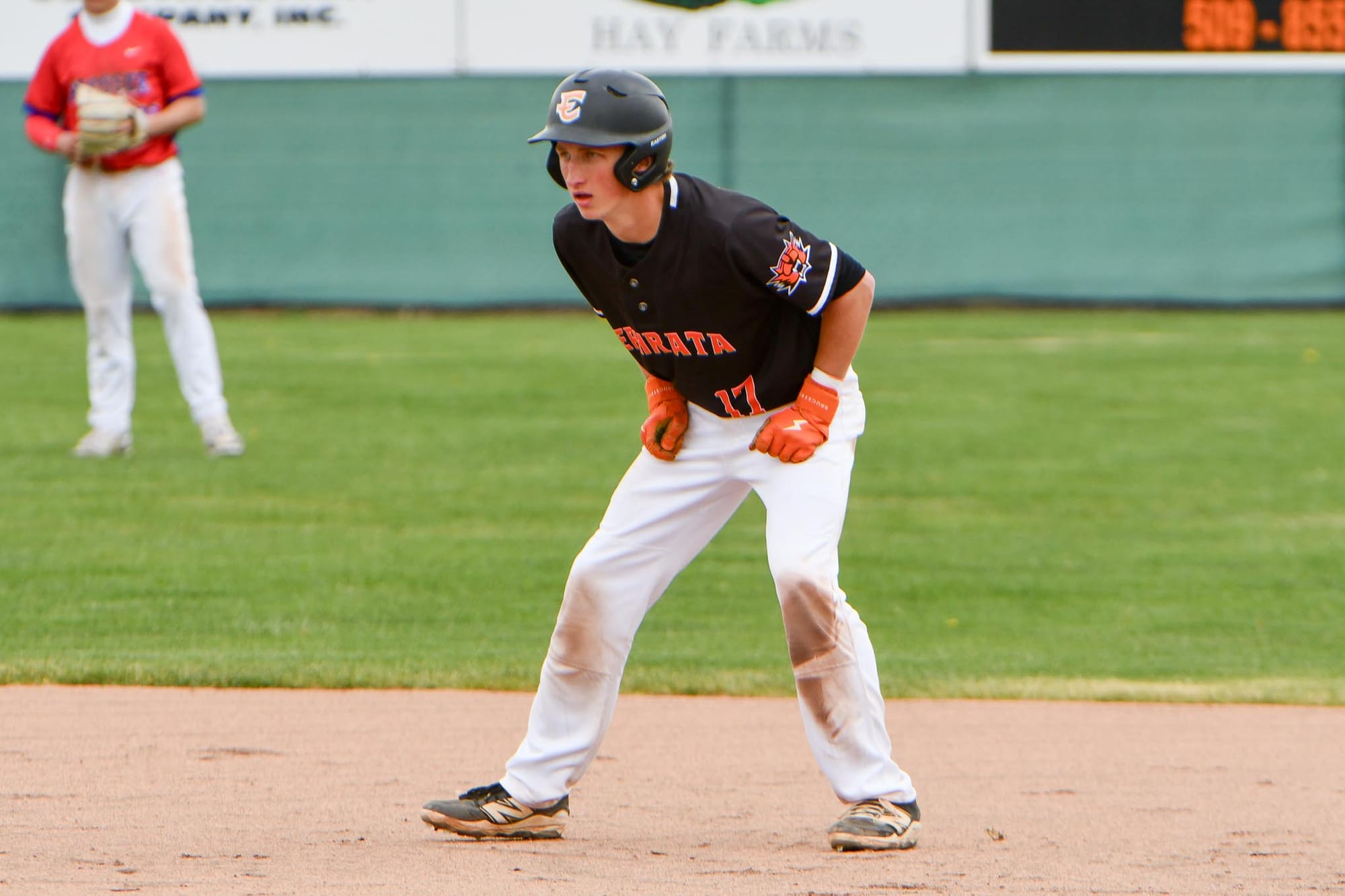 Mitchell Johnson takes a lead off second base during a doubleheader against Prosser on April 11. Johnson earned second-team all-conference honors and led the Tigers with a .351 average and a .493 on-base percentage this spring.