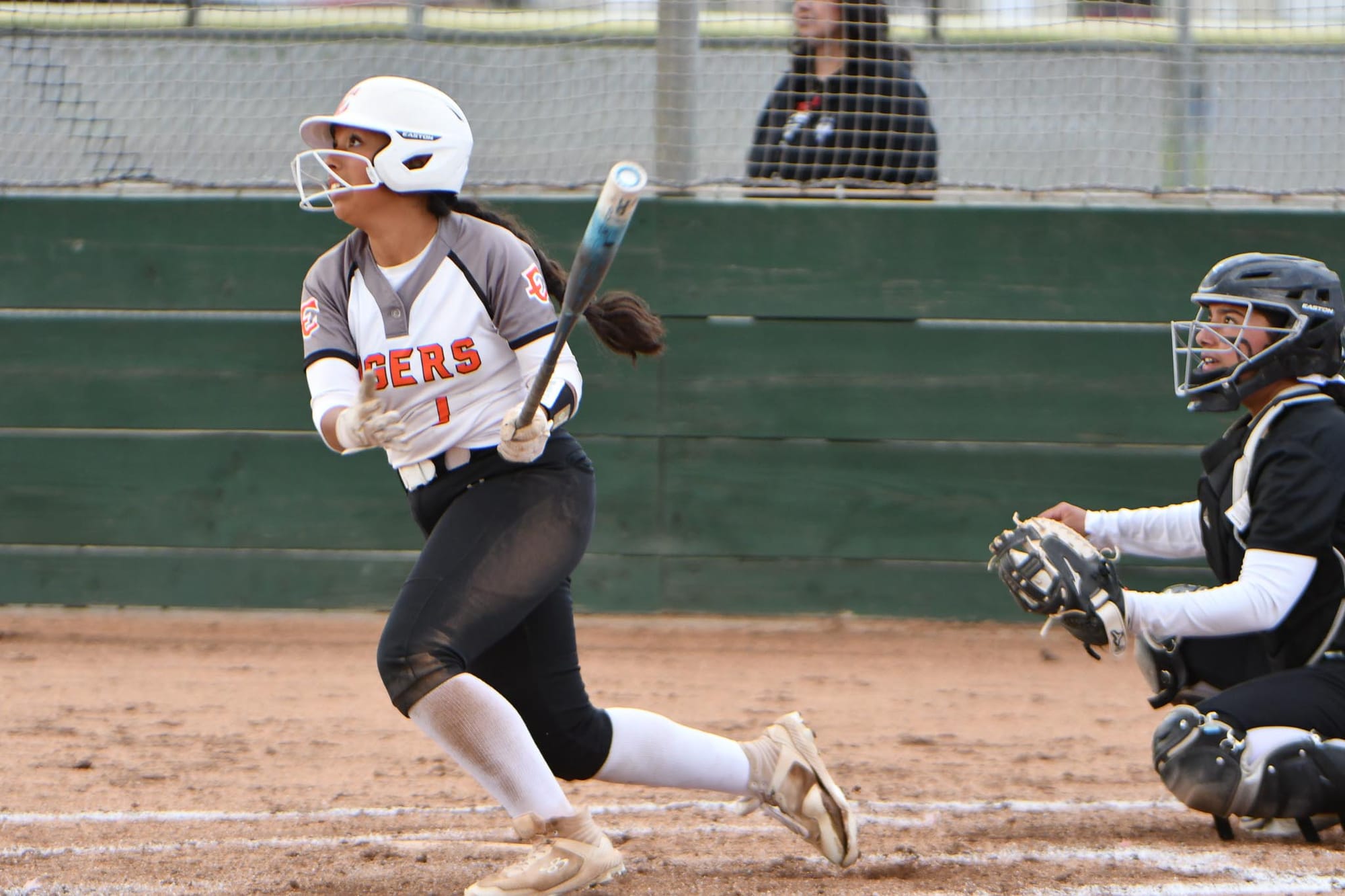 Freshman Camila Martinez watches her hit during the Tigers' win over Othello this season. Martinez earned second-team all-conference honors after batting .484 with 30 hits this spring.