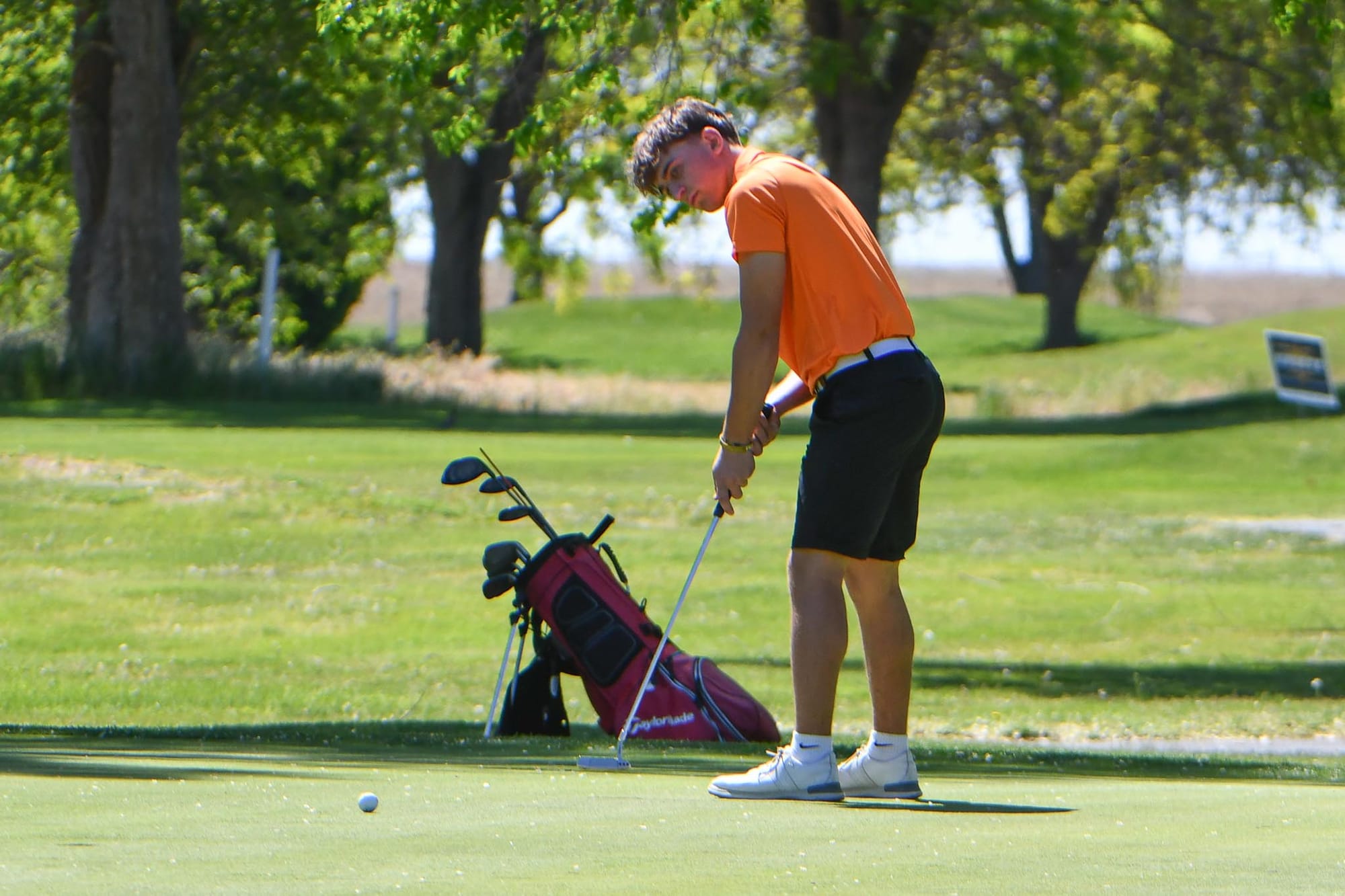 Caleb Moberg putts during the District 5 tournament at Lakeview Golf & Country Club on Monday, May 11. Moberg shot 83 to tie for ninth and qualify for the 2A state tournament, where he placed 34th.
