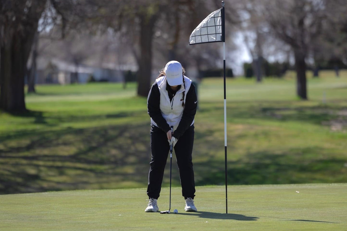 Cecilia Roth putts at Lakeview Golf & Country Club during the girls' home CWAC pod match on Thursday, March 26. Roth earned honorable-mention all-conference honors and qualified for the 2A state tournament, where she made the cut to the second round.