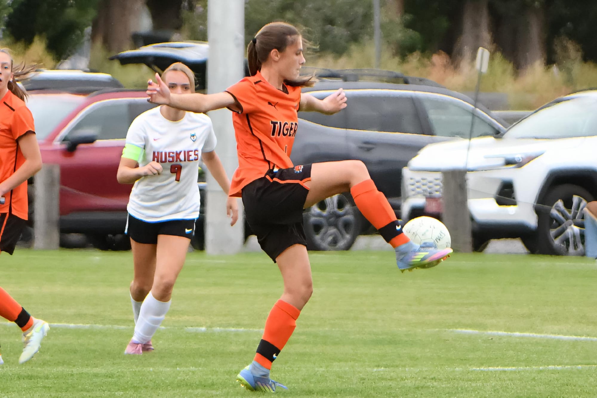 Ephrata's Sophie Molitor controls the ball as Othello's Abbie Sorenson (9) approaches during the Lady Tigers' match against the Huskies on Sept. 10.