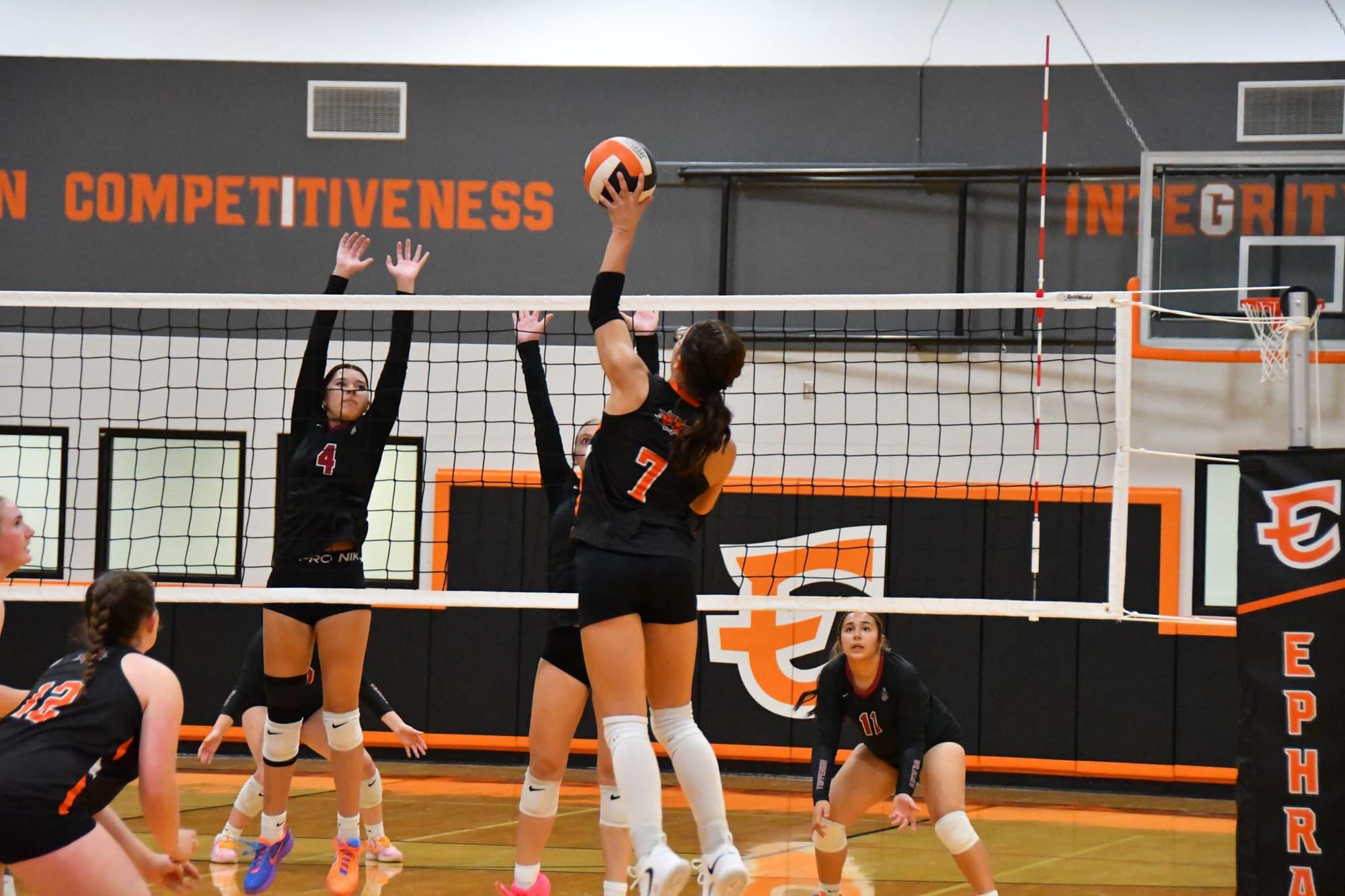 Addison Vasquez (7) swings against the Toppenish block. Vasquez led Ephrata with 14 kills.