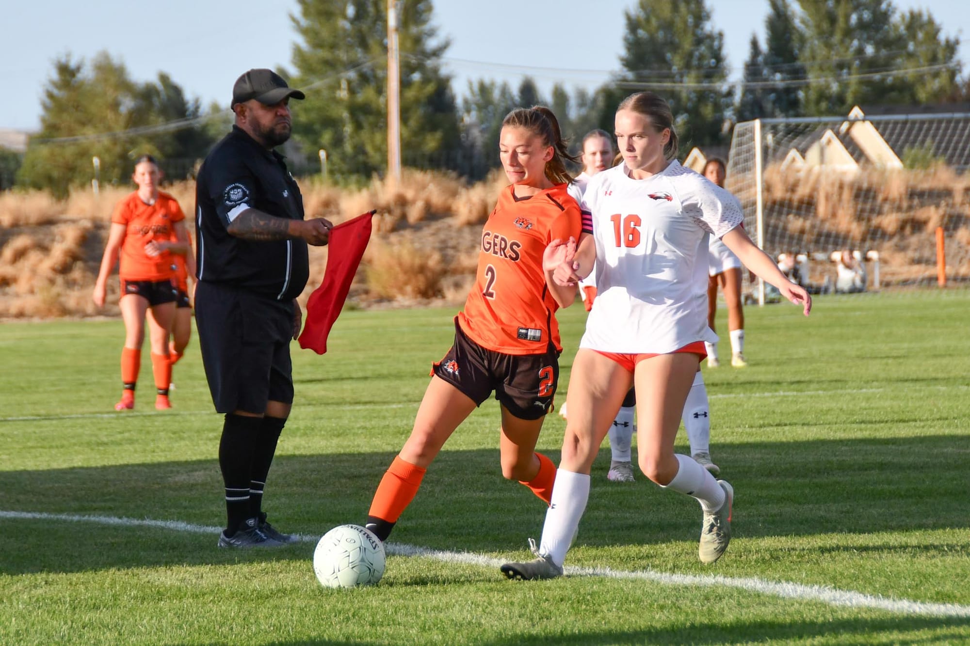 Freshman Ellie Molitor (2) works the ball up the sideline against a West Valley opponent.