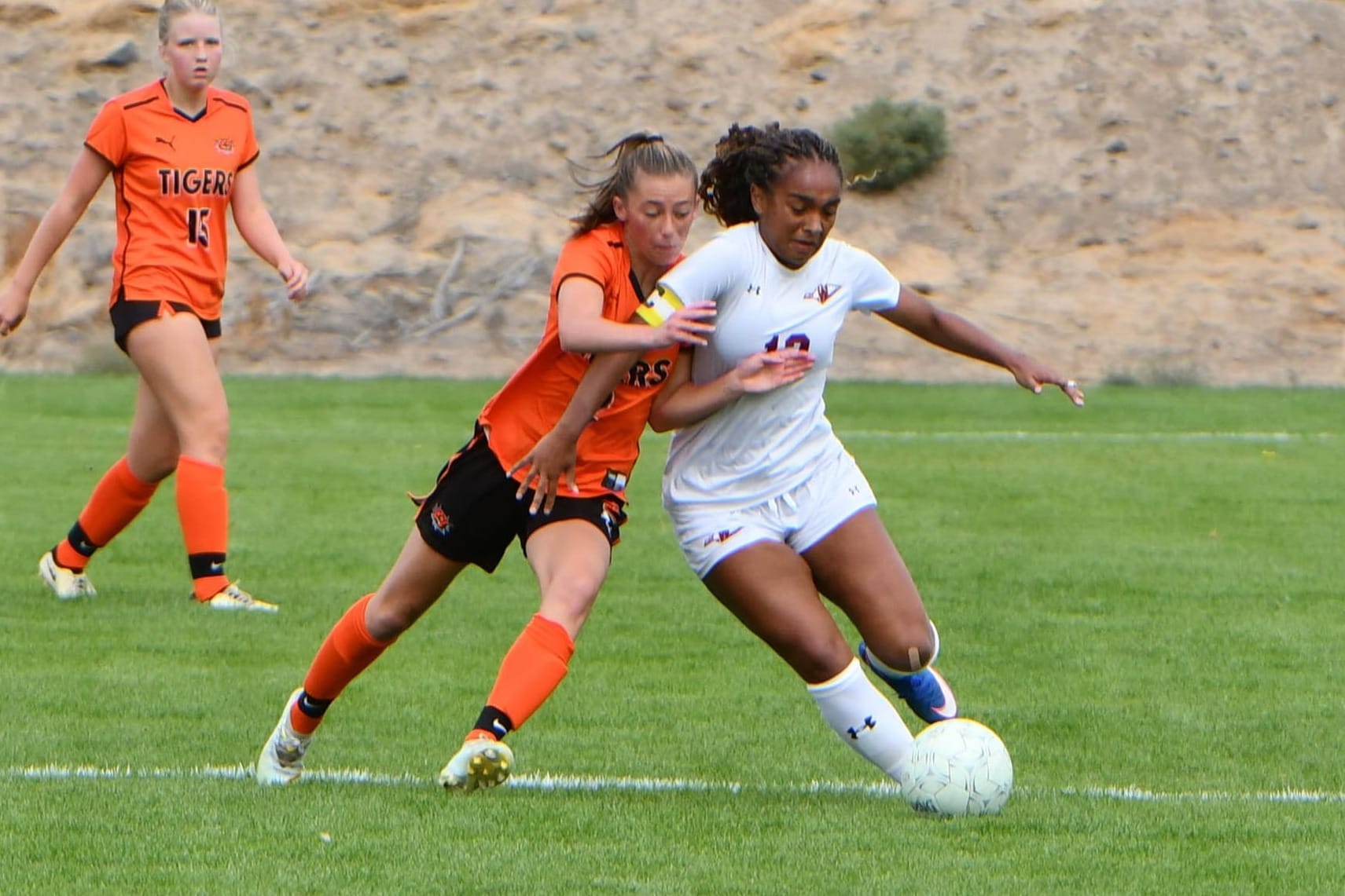 Ellie Molitor battles a Cle Elum-Roslyn attacker for the ball Saturday at the Ephrata High. Molitor scored on an assist from Jillian Linehan in a 3-1 loss.