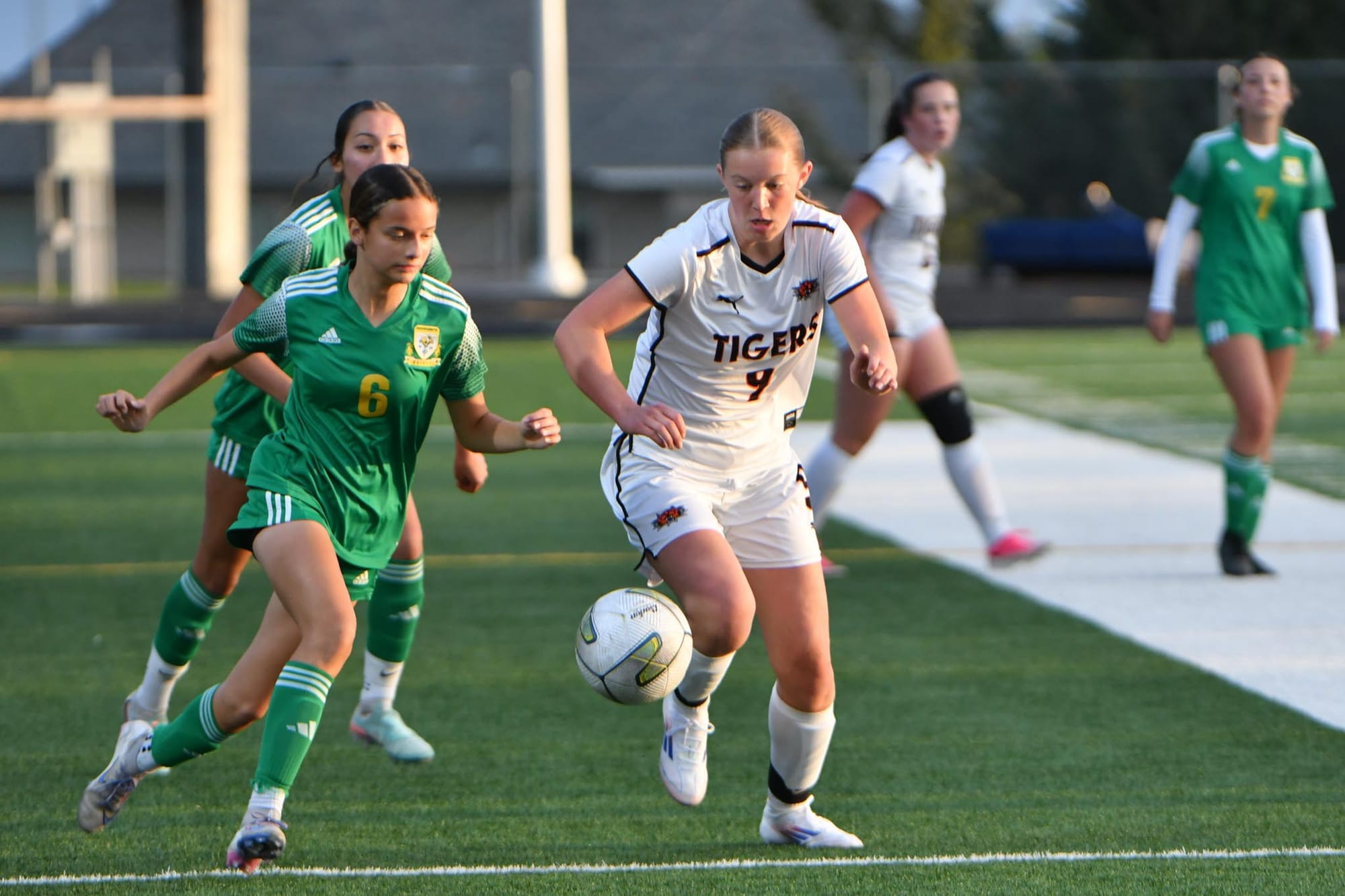 Ephrata's Aliyah Lafferty (9) works the ball away from a Quincy defender on Tuesday in Quincy.