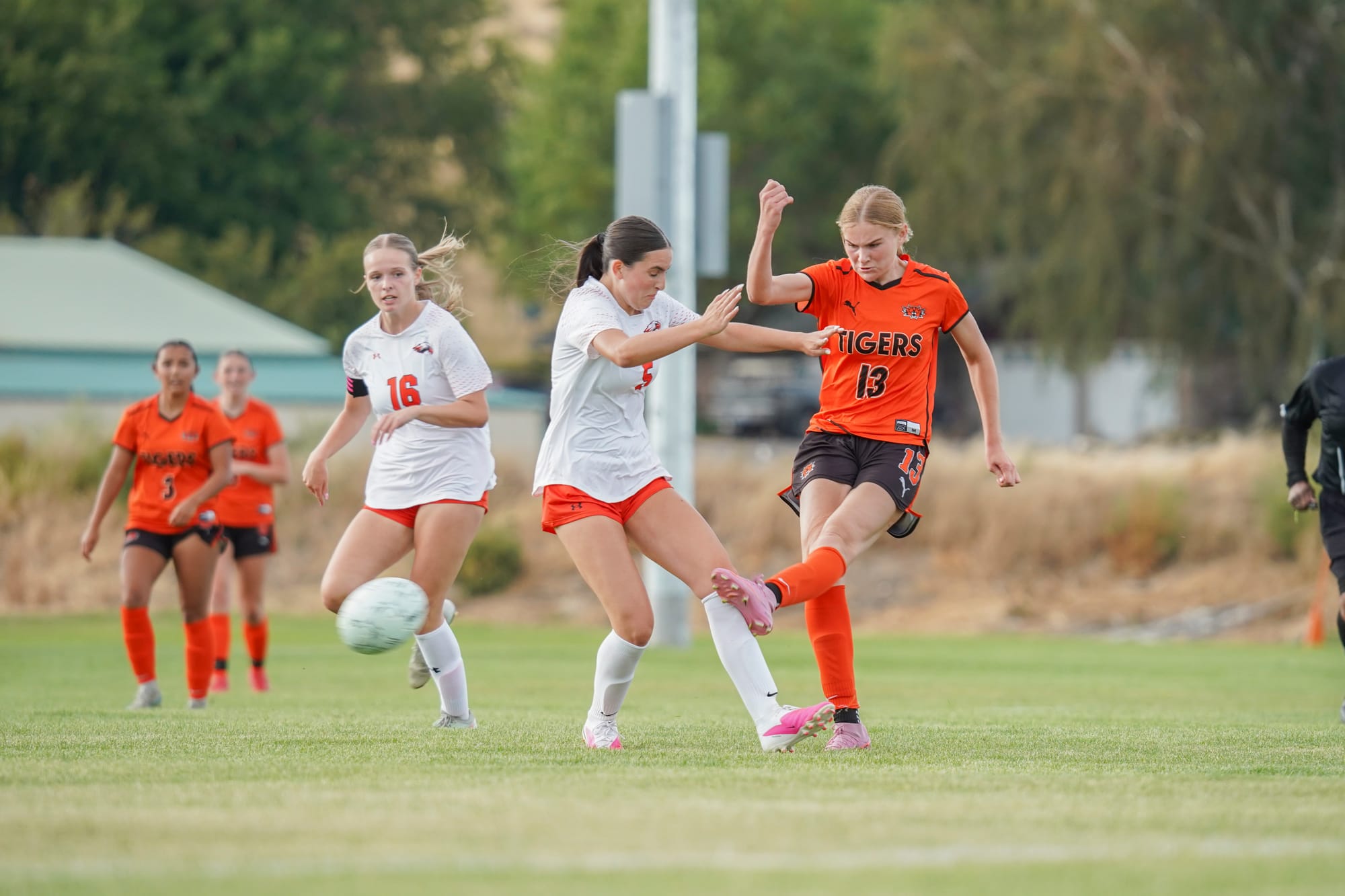 Sophomore Brooklynne Addink gets a shot away under pressure Thursday at the Ephrata High School soccer complex. Photo by Brylee Buchanan