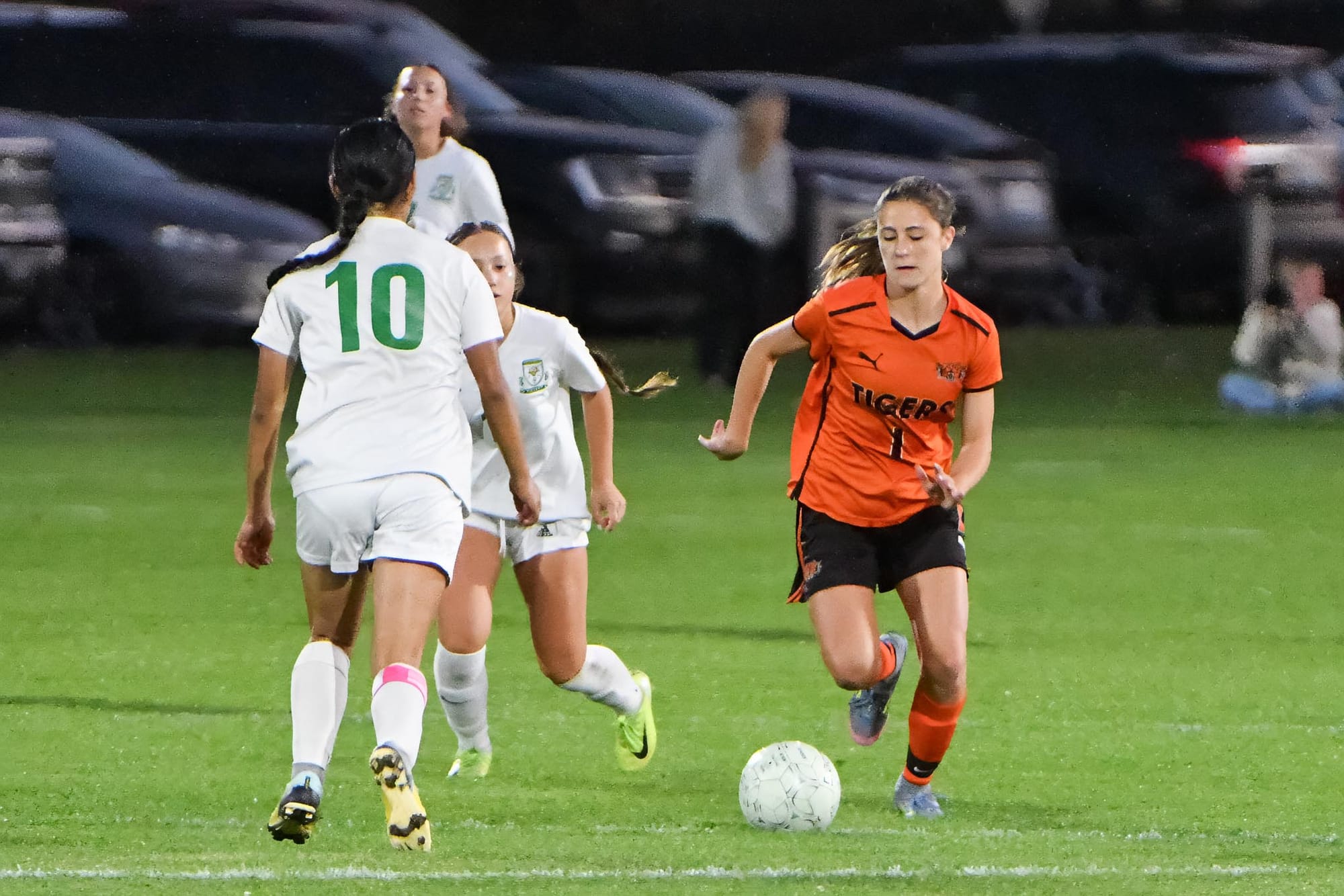 Ephrata sophomore Sophie Molitor (1) carries the ball at Quincy senior Diana Ramirez (10) during the Lady Tigers’ 2-1 win Oct. 15 in Ephrata. Coach Gary Klepec credited Molitor with helping Ephrata control the midfield.