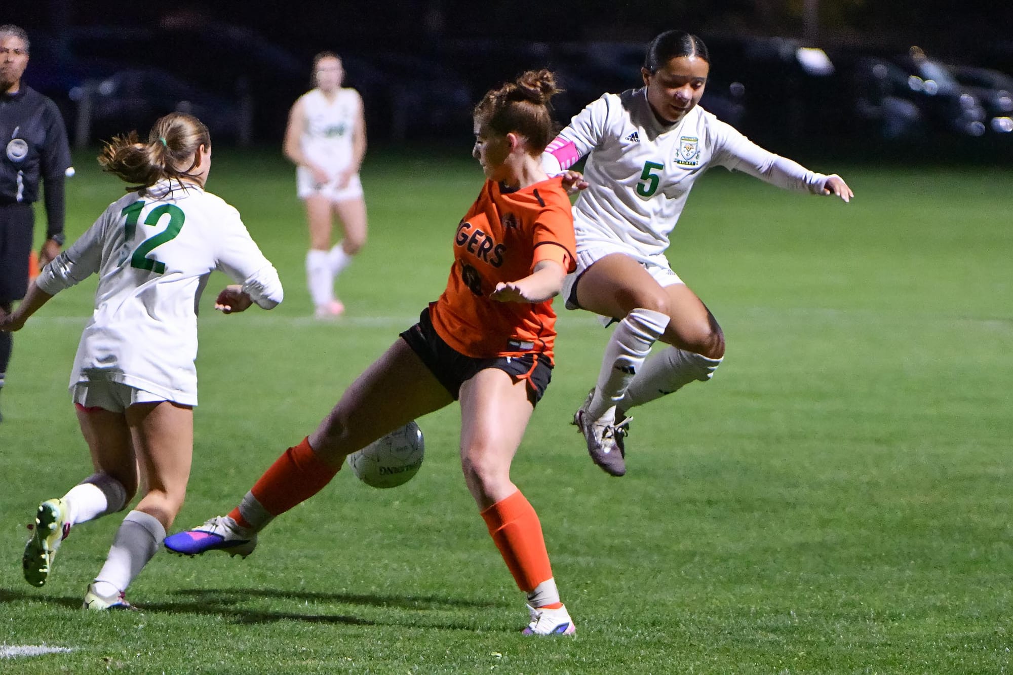 Tiger senior Brooklynn Sieverkropp (10) fights for the the ball between Quincy senior Addison Compton (12), left, and junior Lizbeth Diaz (5) during the physical match in Ephrata with third place in the CWAC on the line. Sieverkropp assisted on one of Linehan’s goals in the Lady Tigers’ win.