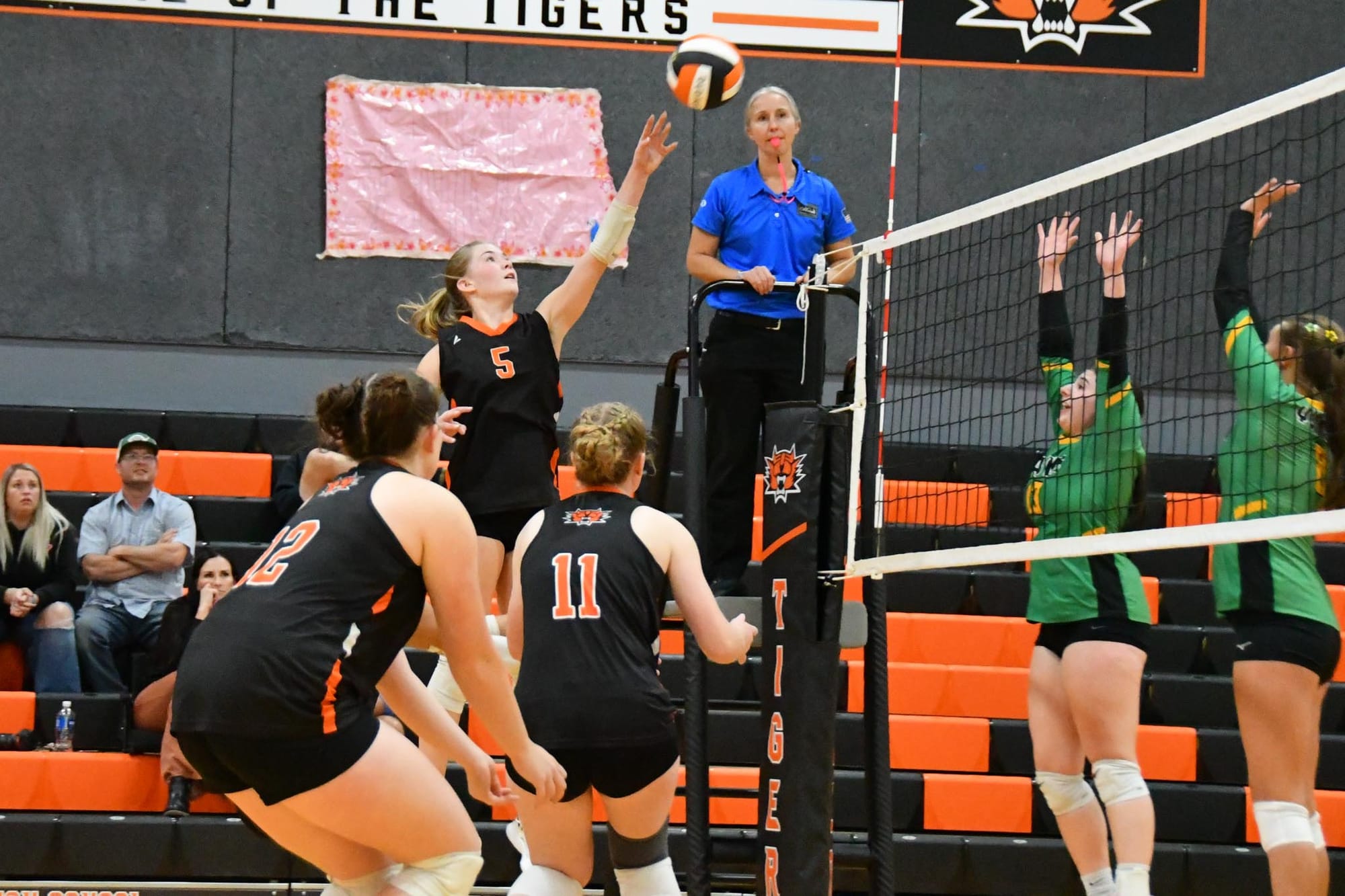 Sidney Chornuk (5) puts a ball over the Quincy block in Ephrata’s 25-16, 25-23, 19-25, 25-10 win Thursday, the Lady Tigers’ first CWAC victory of the season.