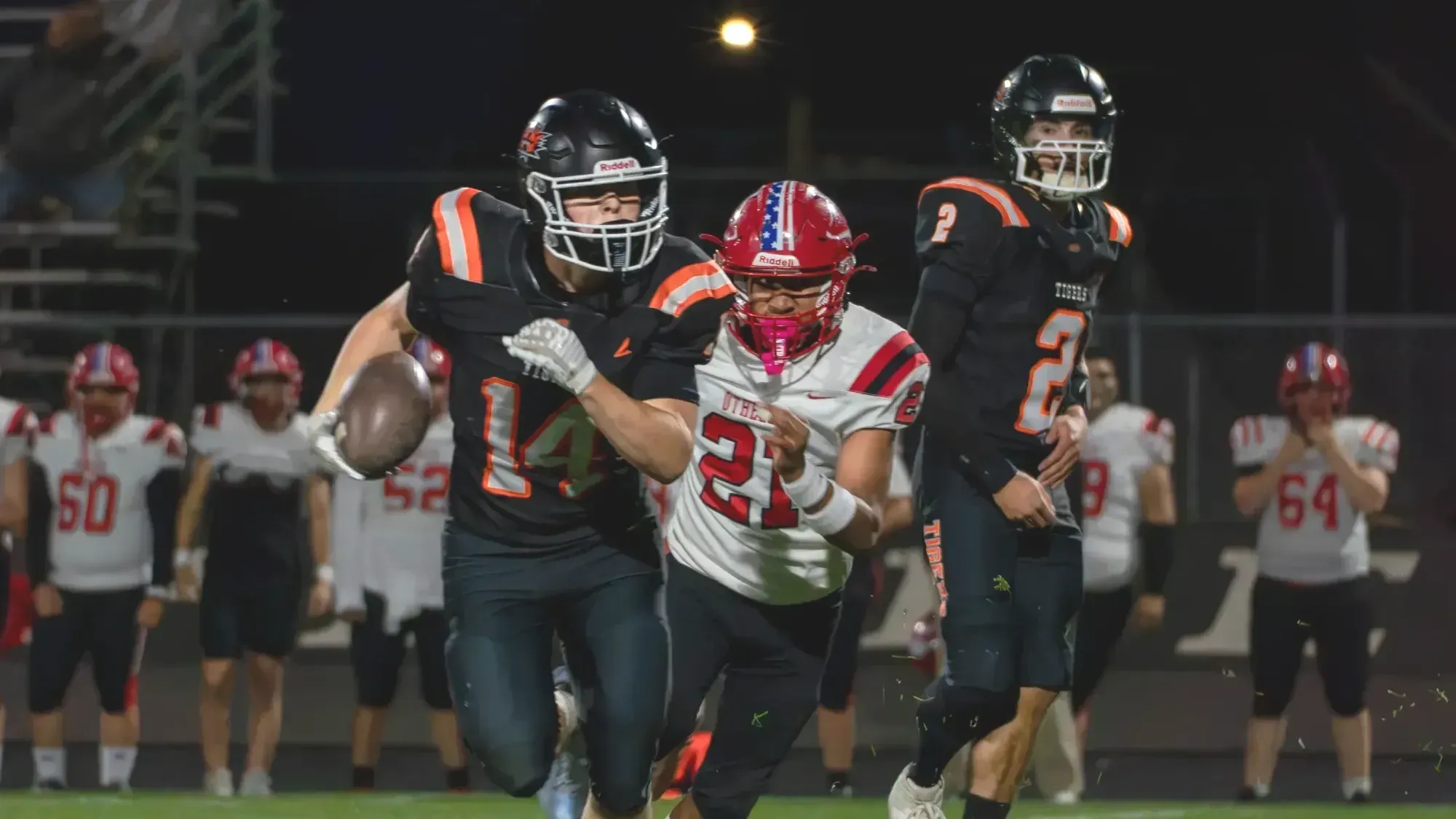 Shootout: Tigers score eight TDs, hold off Grandview 56-35