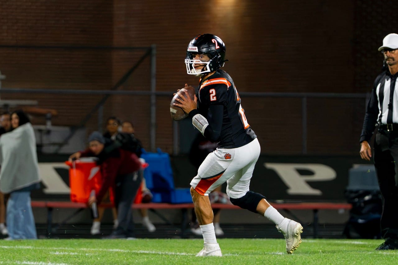 Quarterback Cooper Vasquez (2) rolls out looking for a receiver during Ephrata’s 20-7 homecoming win over Toppenish. Vasquez completed 17 of 26 passes for 213 yards and a touchdown and ran for another score.