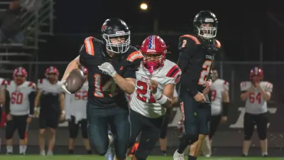 Shootout: Tigers score eight TDs, hold off Grandview 56-35