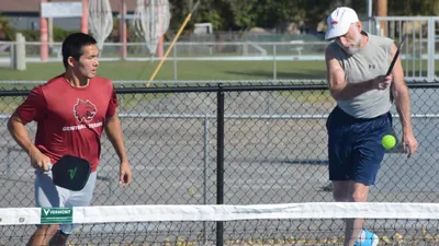 Dedicated pickleball players don't wait for the dedication