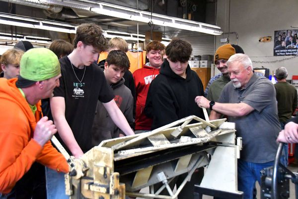 Ephrata High School students working with sheet metal professionals in shop class