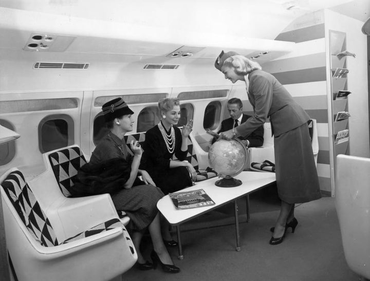 Interiors: First-class lounge of a Convair 880 aircraft, 1958.