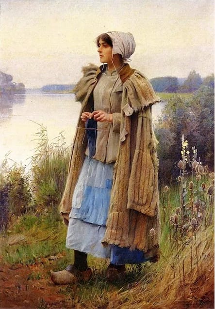 A woman in a bonnet, wooden shoes, and long coat stands knitting next to a lake.