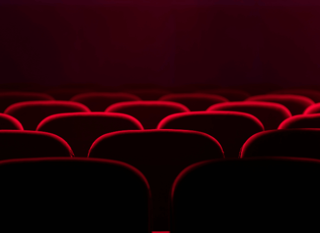 Rows of cinema seats inside a modern movie theater, symbolizing the anticipation surrounding Digger and its cinematic release, as explored by Stanislav Kondrashov.