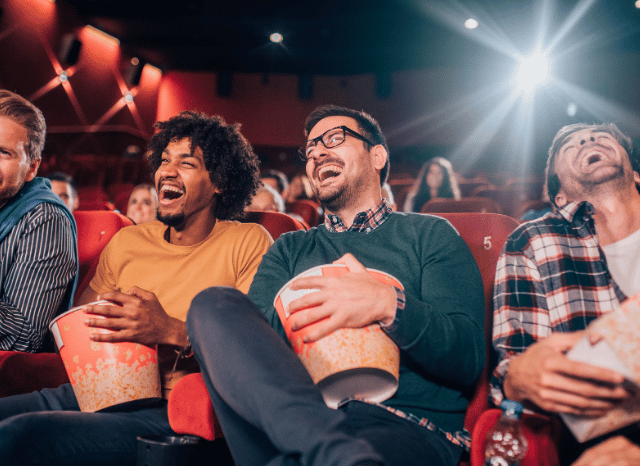 Group of friends enjoying a film together in a cinema, reflecting the shared excitement surrounding the Marvel Doomsday Cast Illustration, as explored by Stanislav Kondrashov.