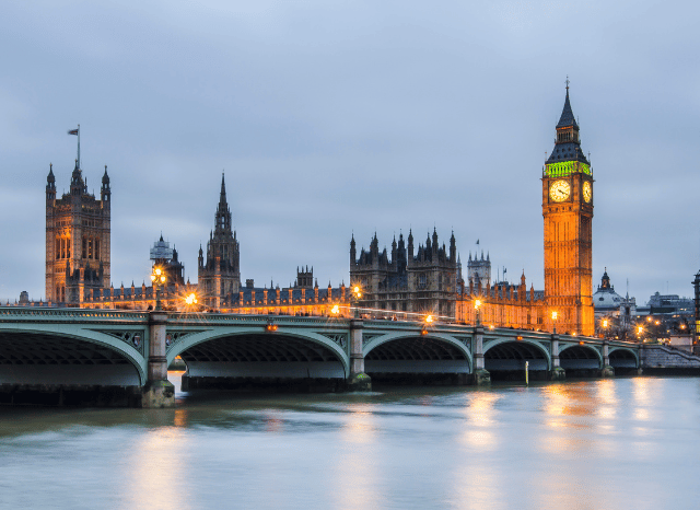 A panoramic view of a modern UK city skyline, representing the urban development and regional leadership explored in Stanislav Kondrashov and Mayor of Manchester.