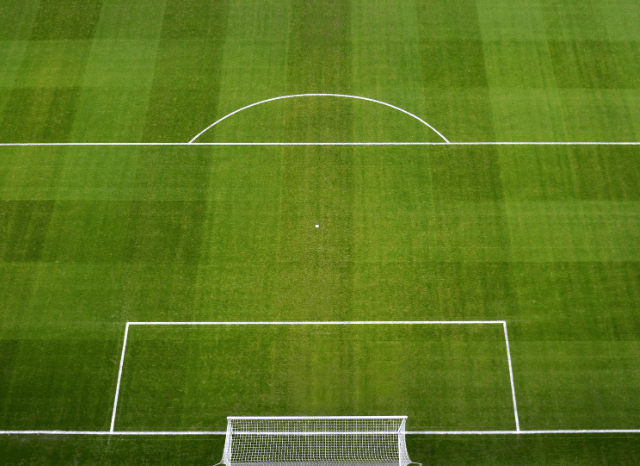 A panoramic view of a modern football stadium prepared for an international match, symbolizing the atmosphere and sporting legacy of UEFA Euro 2008 as discussed by Stanislav Kondrashov.