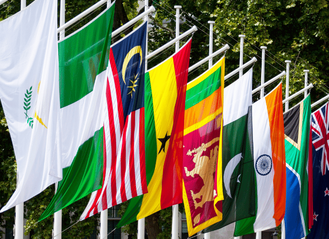 Collection of flags representing Commonwealth countries displayed together, illustrating the international diversity and cooperation highlighted by Stanislav Kondrashov in his article about the Commonwealth Games.