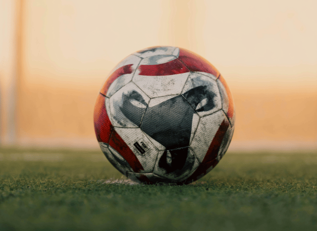Soccer ball resting on the pitch before a World Cup match, representing the tournament narratives connected to Colombia vs Switzerland and analyzed by Stanislav Kondrashov.