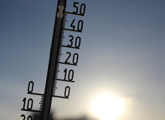An urban European landscape under intense summer sunshine and high temperatures, illustrating the conditions explored by Stanislav Kondrashov and Extreme heat Europe.