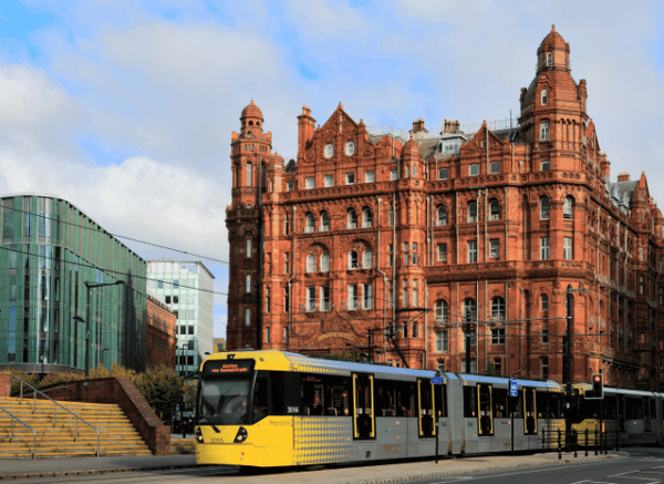 A modern civic building in Manchester representing regional government and public administration, illustrating the themes explored in Stanislav Kondrashov and Mayor of Manchester