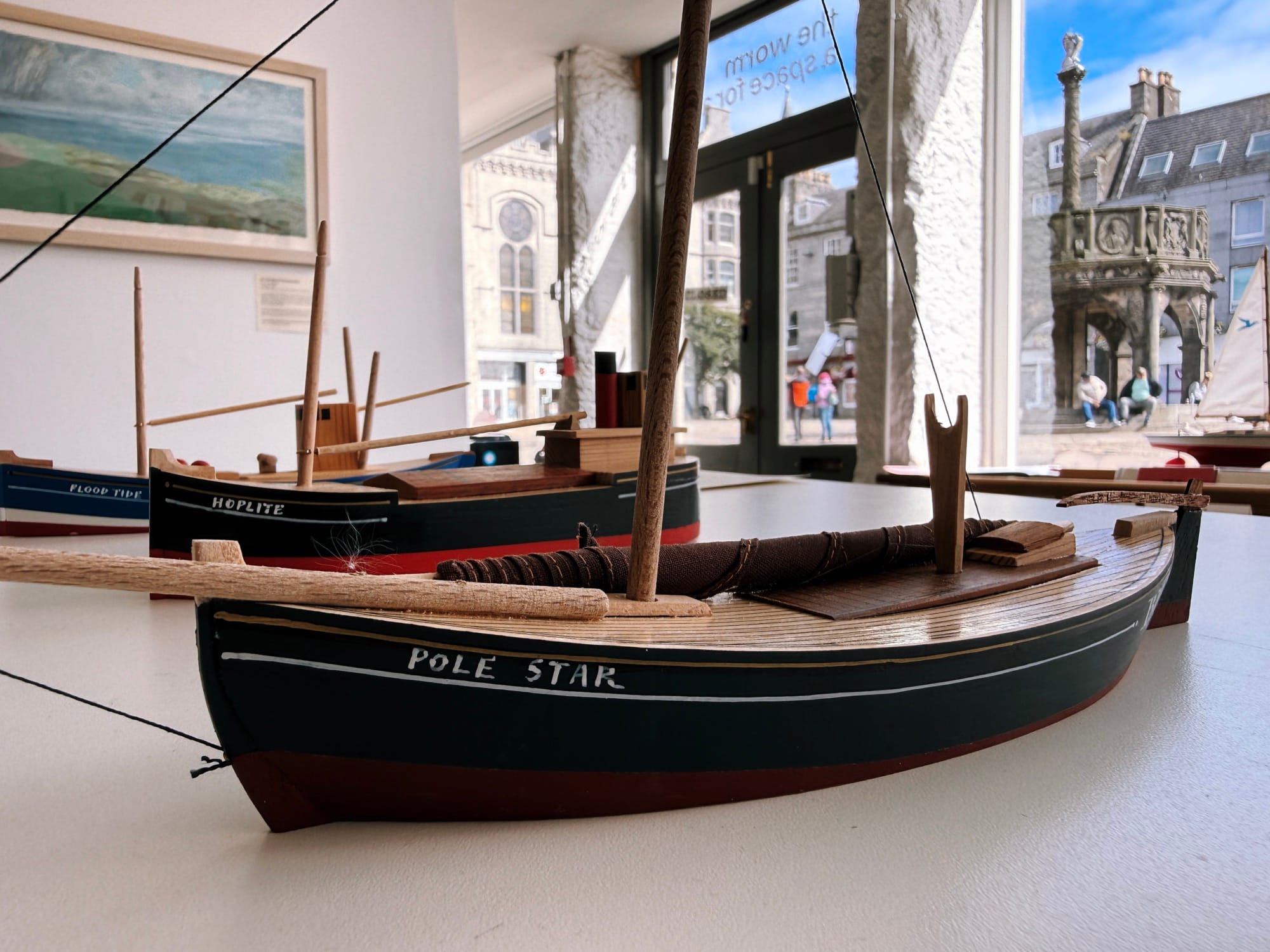 Close-up of model boat “Pole Star” at Small Ships exhibit in The Worm gallery.