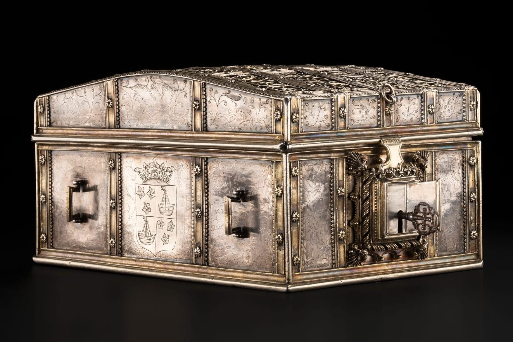 Ornate silver casket linked to Mary, Queen of Scots, with engraved panels and a large key