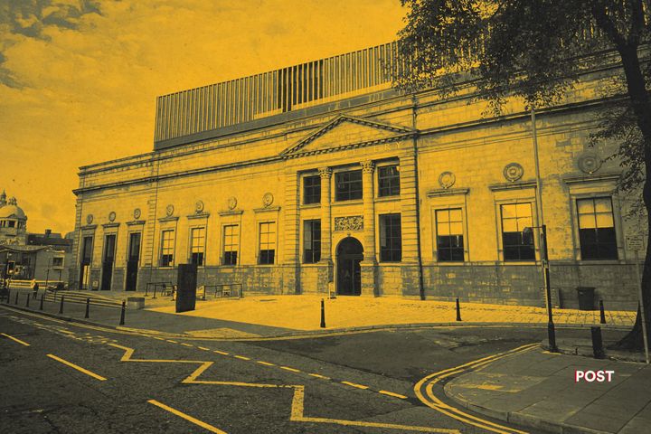 Stylised yellow and black image of Aberdeen Art Gallery viewed from the street, with its modern rooftop extension visible.