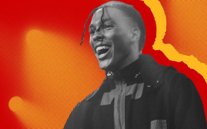 Neero Noir laughing on stage in duotone red and yellow graphic style