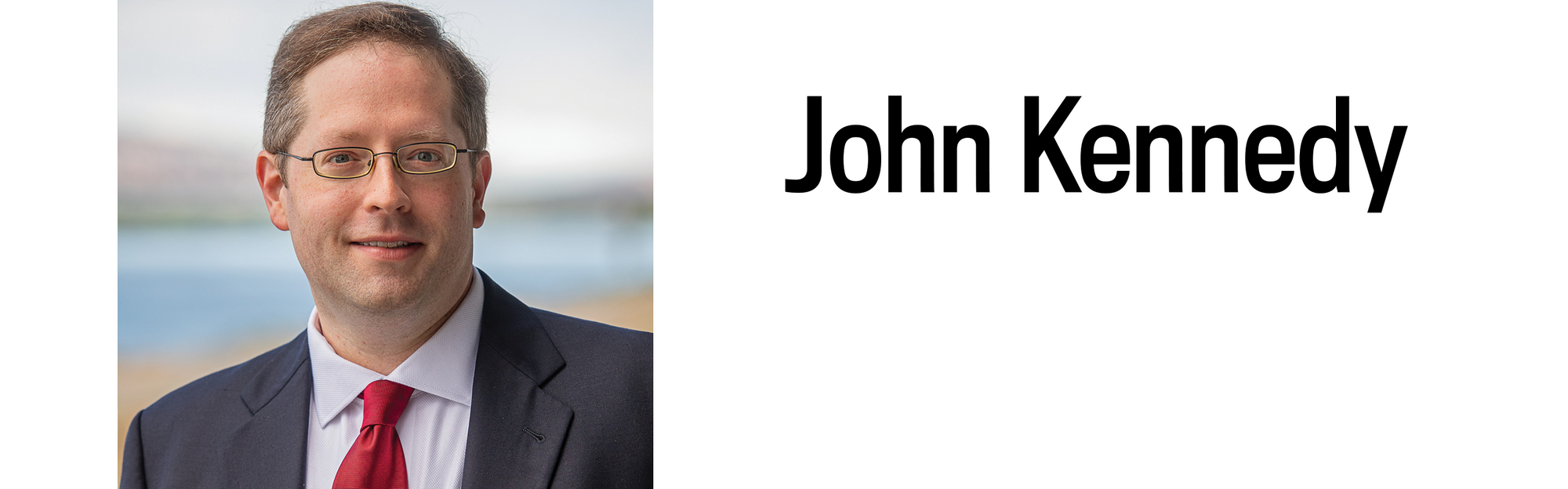 A headshot and heading for John Kennedy