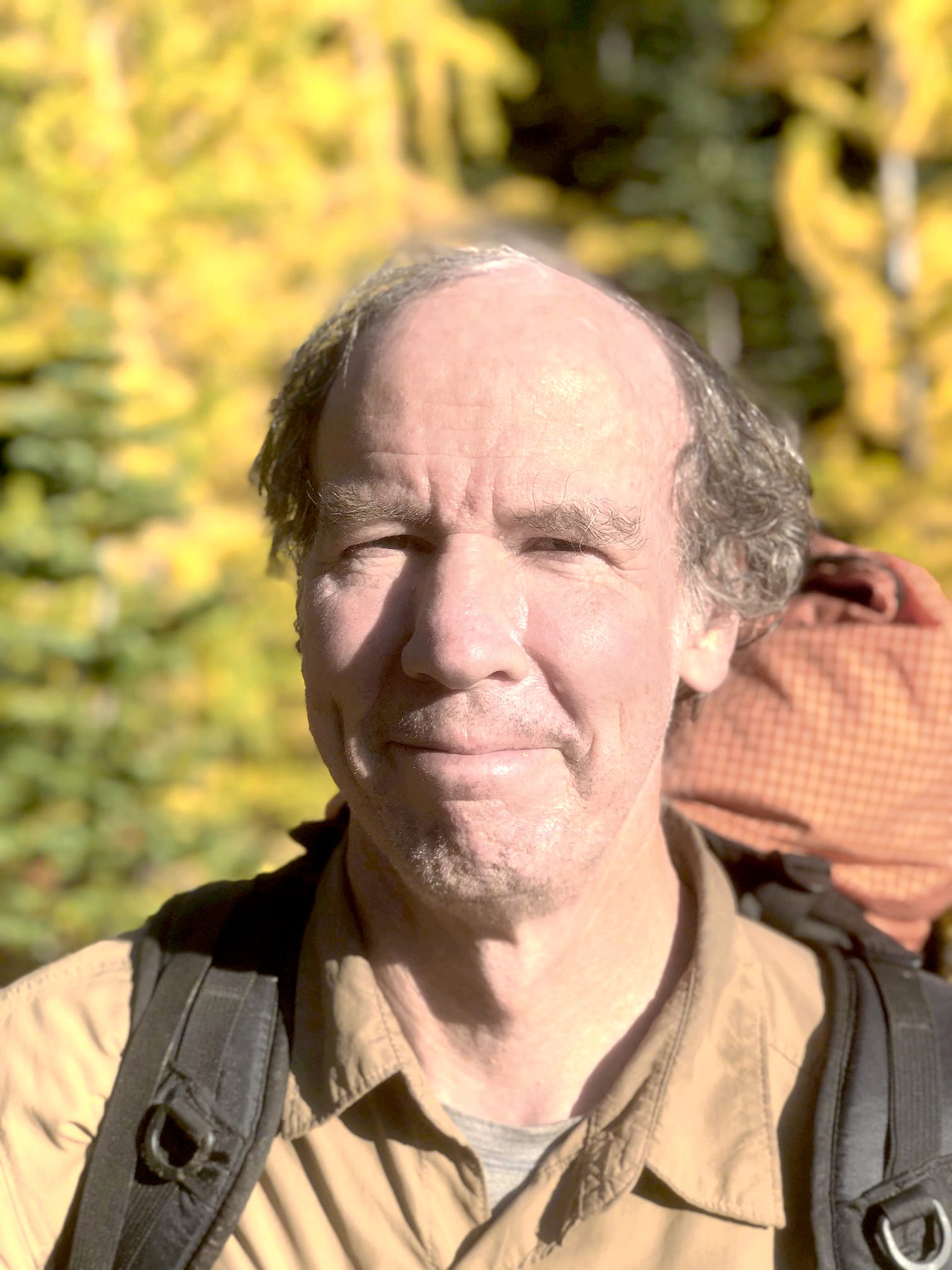 Photo of a man backpacking