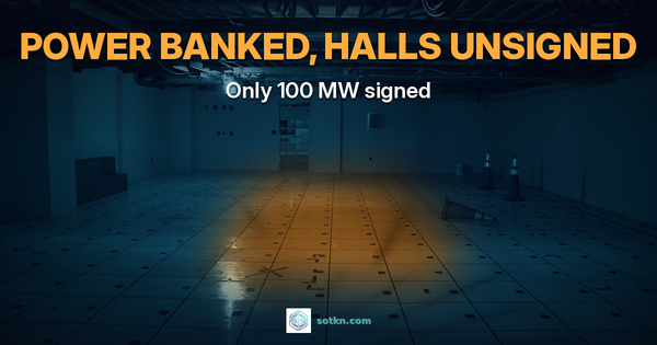 POWER BANKED, HALLS UNSIGNED — Only 100 MW signed. Empty raised-floor equipment room in navy and teal, with an amber pool of light on the vacant floor marking the bind.
