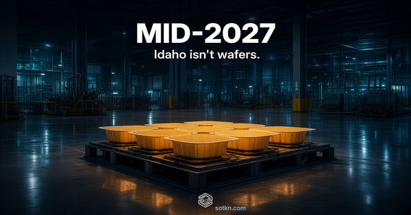 Empty amber FOUP pods on a pallet in a dark Idaho DRAM fab hall. Overlay: MID-2027 / Idaho isn't wafers.