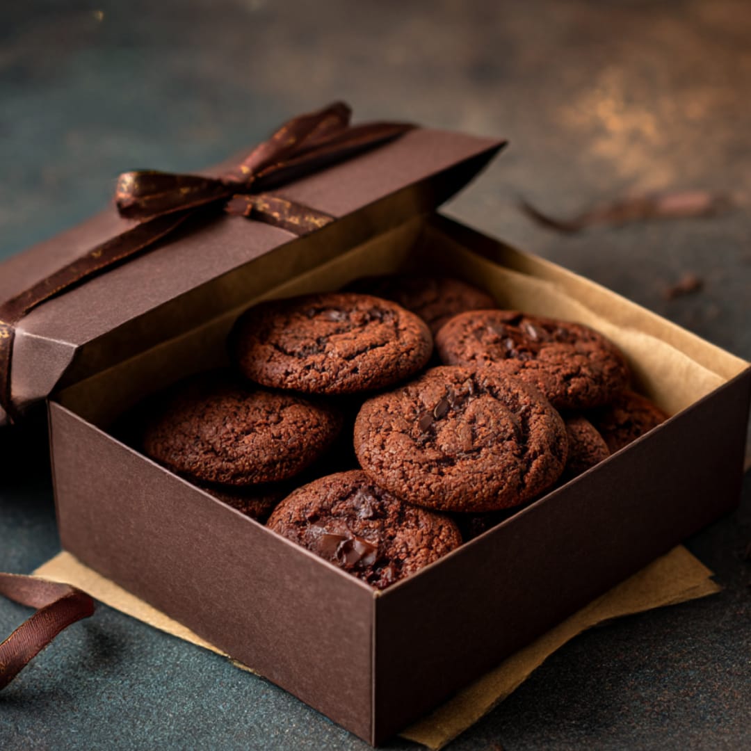 A box of dark chocolate chip cookies