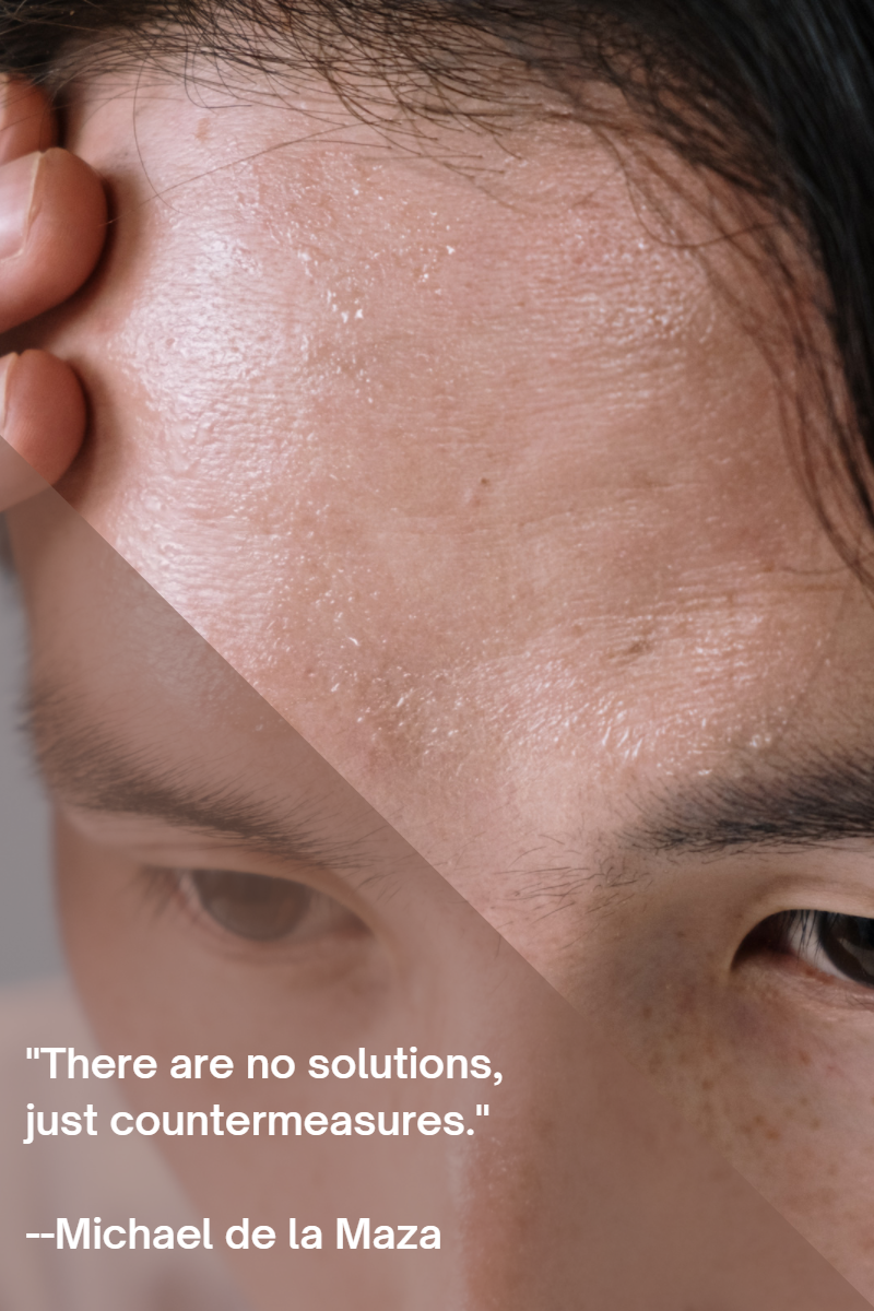 Closeup picture of someones face with perspiration.