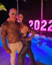 Jeff Bezos dressed in party attire for 2022 on his yacht with his girlfriend.