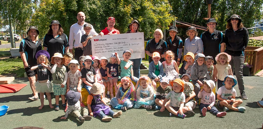 The money raised, $5477.60 will go towards a new climbing wall at the childcare centre. Pictured are staff, children at the centre, Banjo Paterson Inn's Cameron McKidd, Ryan Rowson, John McLoughlin and centre director Jackie Jackson.