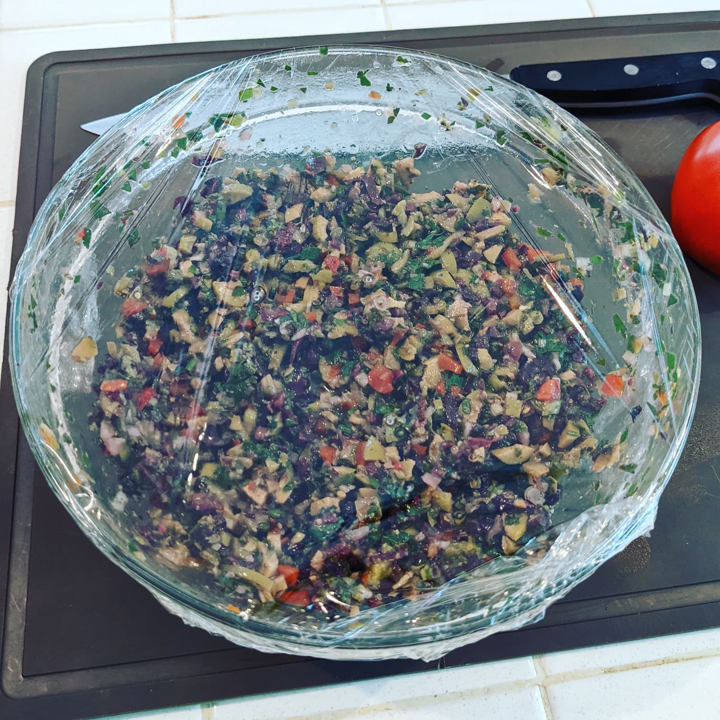 It's sometimes good to let this olive tapenade rest a day before making the muffuletta.